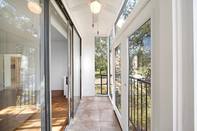 sunroom / solarium with ceiling fan