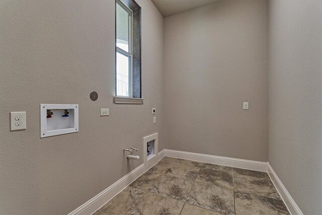 laundry area with hookup for a gas dryer, electric dryer hookup, and hookup for a washing machine