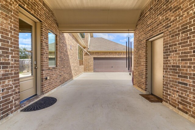 view of patio / terrace with a garage