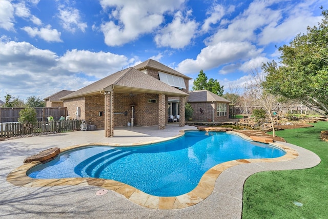 view of swimming pool with a patio area