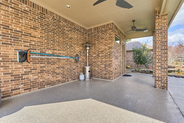 view of patio with ceiling fan