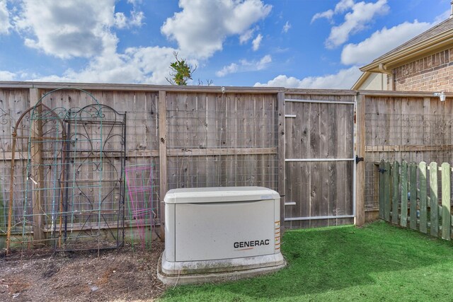 exterior details with a power unit and fence