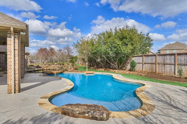 view of swimming pool featuring a patio area