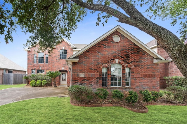 front facade with a front lawn