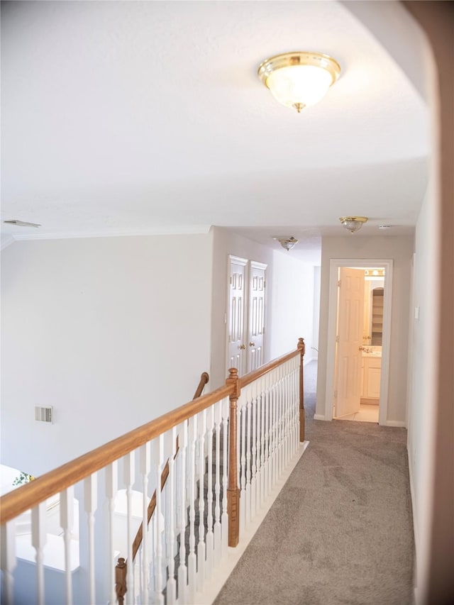 hall featuring carpet and french doors