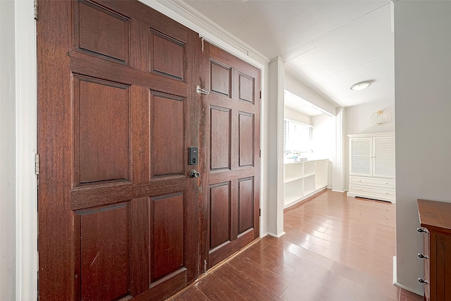 entryway with wood-type flooring