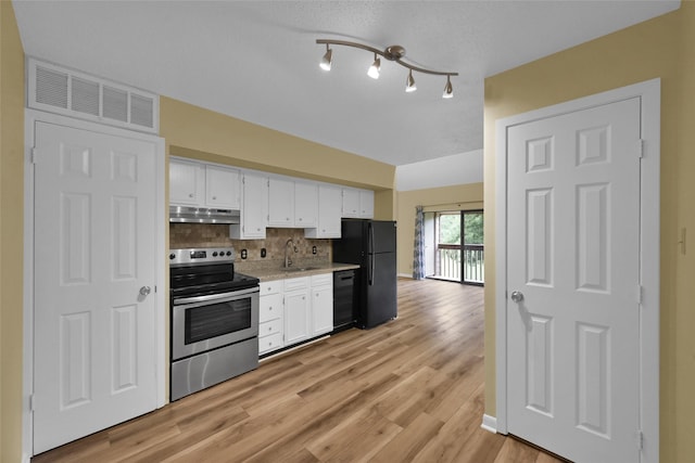 kitchen featuring black appliances, white cabinets, sink, light wood-type flooring, and tasteful backsplash