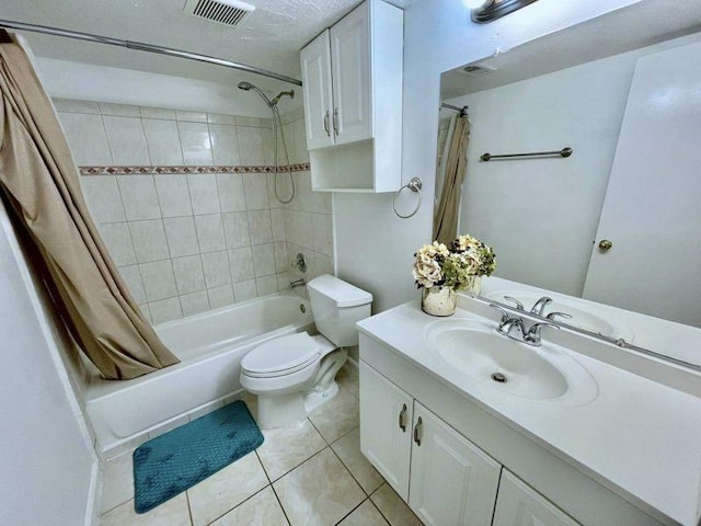 full bathroom featuring shower / bathtub combination with curtain, tile patterned flooring, vanity, and toilet