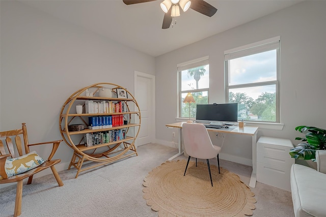 office featuring light colored carpet and ceiling fan