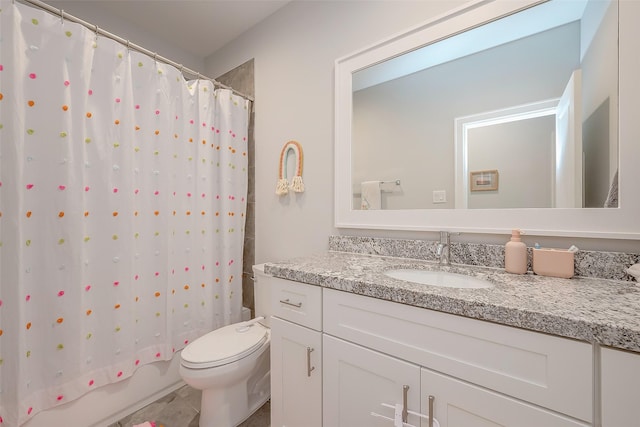 full bathroom featuring vanity, toilet, and shower / bath combo with shower curtain