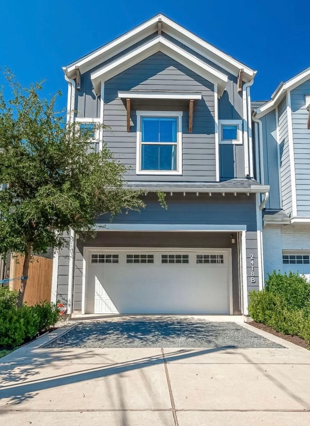 view of front of property featuring a garage