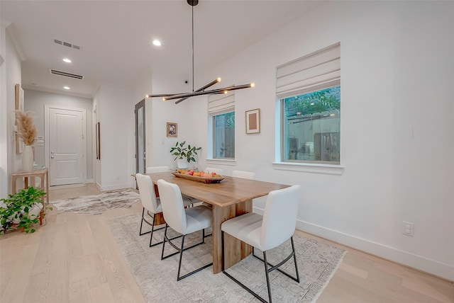 dining space with light wood-type flooring