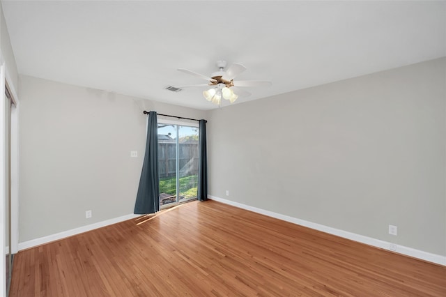 spare room with ceiling fan and light hardwood / wood-style floors