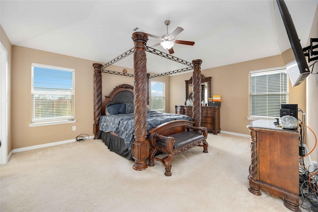 bedroom featuring ceiling fan and light colored carpet