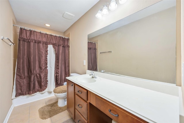 full bathroom featuring tile patterned floors, vanity, toilet, and shower / tub combo