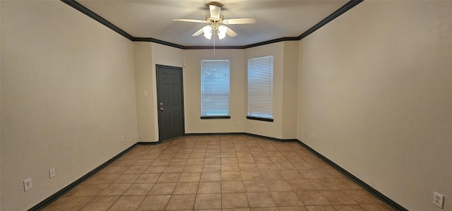 unfurnished room with ceiling fan and ornamental molding