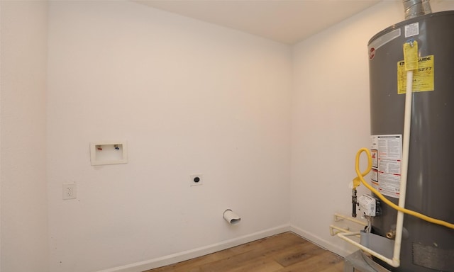 laundry area featuring hookup for an electric dryer, wood-type flooring, washer hookup, and water heater