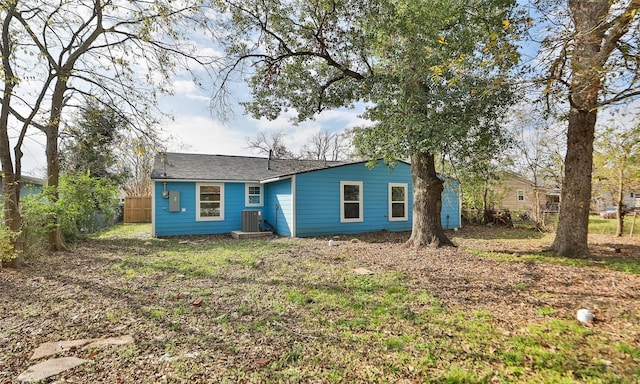 back of property featuring central AC unit