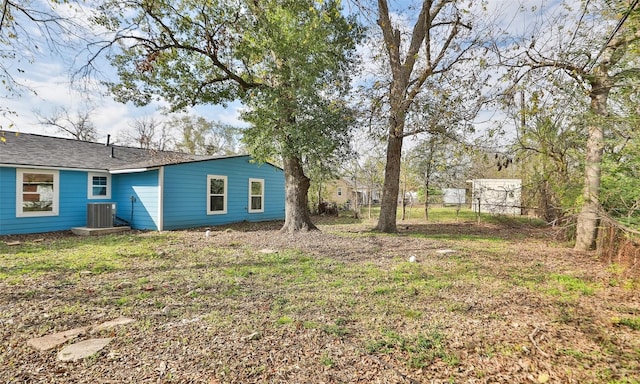 view of yard with central AC