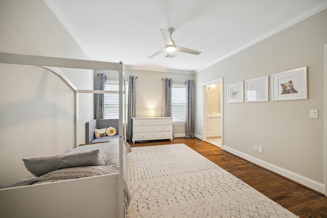 bedroom with ceiling fan, wood-type flooring, crown molding, and connected bathroom