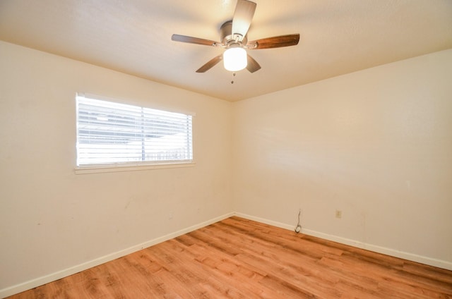 empty room featuring light hardwood / wood-style floors and ceiling fan