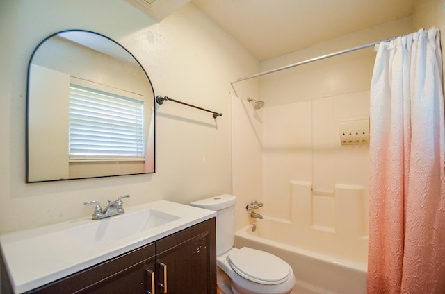 full bathroom with vanity, shower / bath combo, and toilet