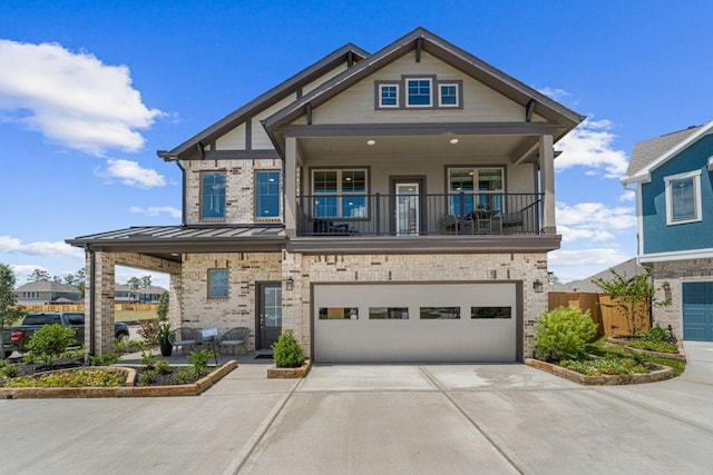 craftsman-style house with a balcony and a garage