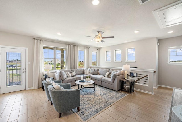 living room featuring ceiling fan