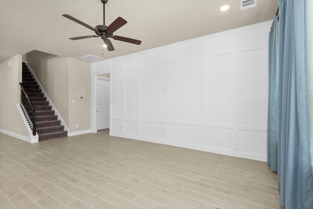 interior space featuring light hardwood / wood-style floors and ceiling fan