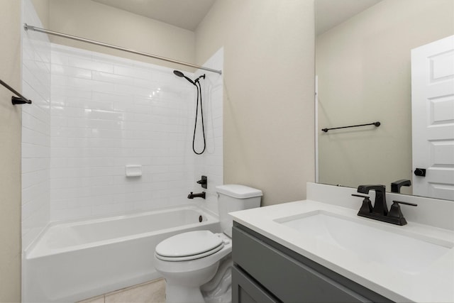 full bathroom featuring tile patterned floors, vanity, toilet, and shower / bathtub combination