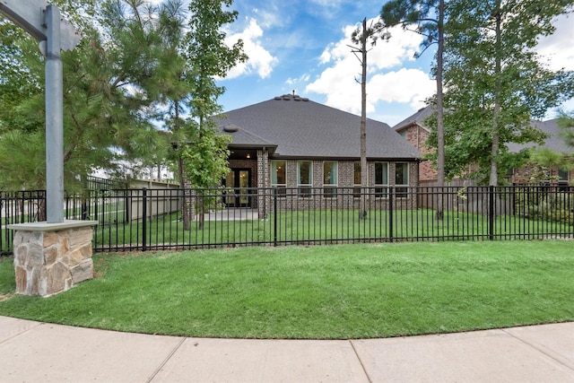 view of front of home with a front yard