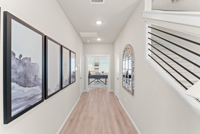 corridor featuring light wood-type flooring