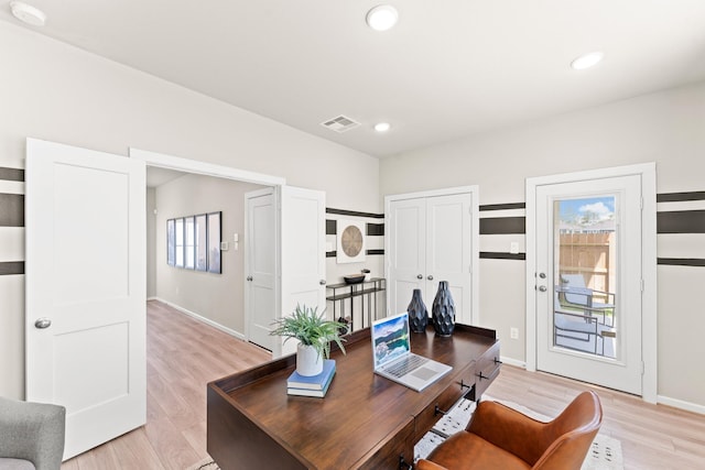 office space featuring light wood-type flooring