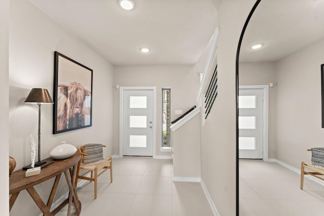 foyer featuring light tile patterned floors