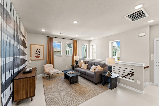 living room featuring a wealth of natural light