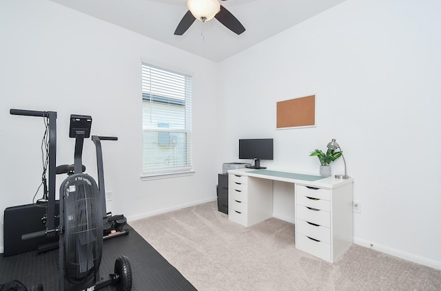 office space featuring ceiling fan and light colored carpet