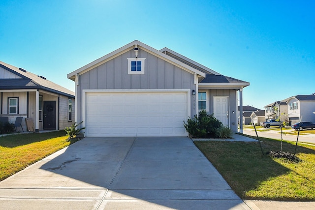 view of front facade with a front lawn and a garage