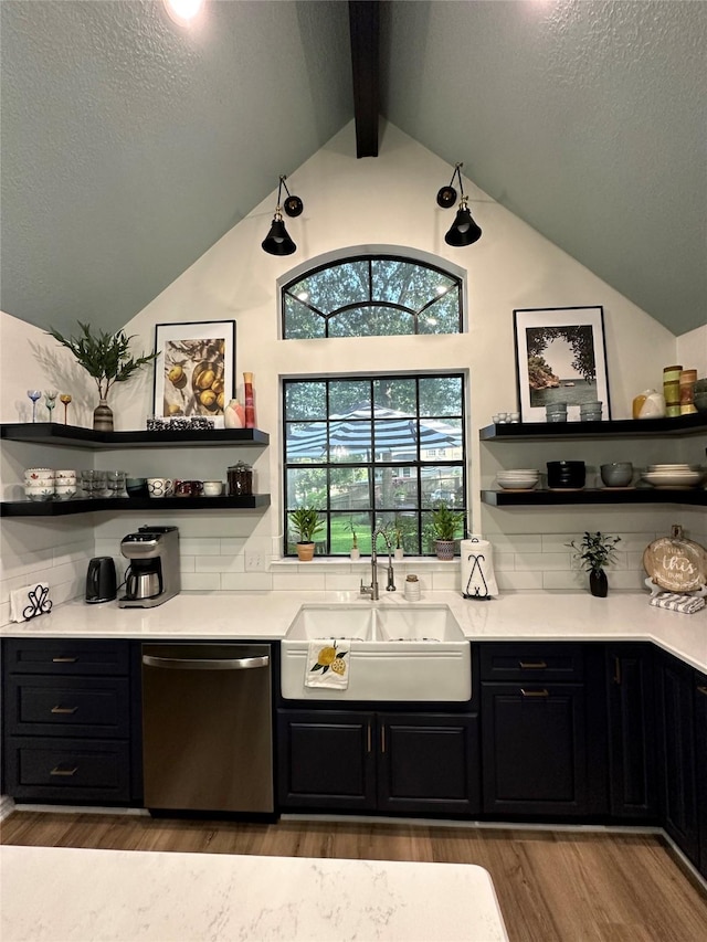 bar with decorative backsplash, sink, lofted ceiling with beams, hardwood / wood-style flooring, and dishwasher