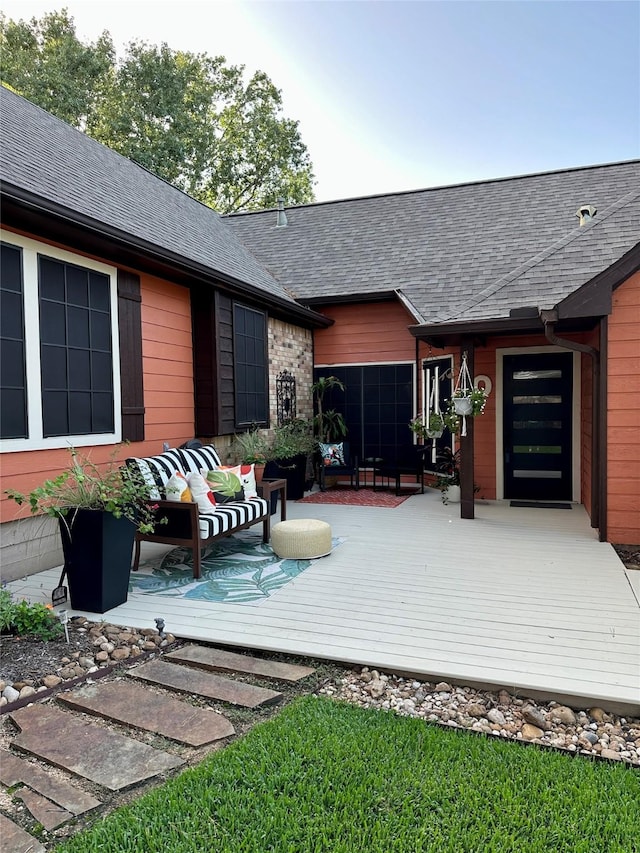 wooden deck featuring an outdoor living space