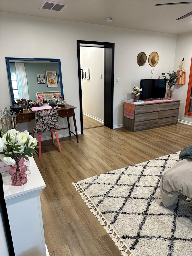 bedroom with wood-type flooring