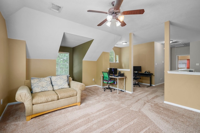 office featuring carpet flooring, ceiling fan, a healthy amount of sunlight, and lofted ceiling