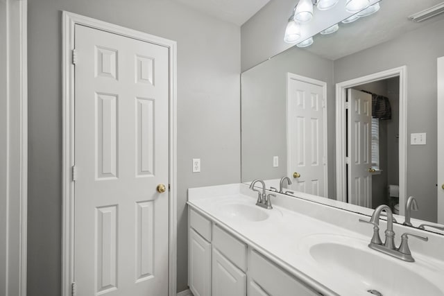 bathroom featuring vanity