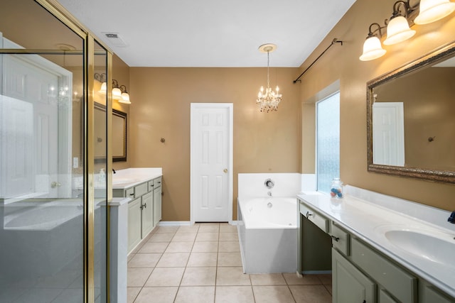 bathroom with separate shower and tub, tile patterned flooring, vanity, and an inviting chandelier