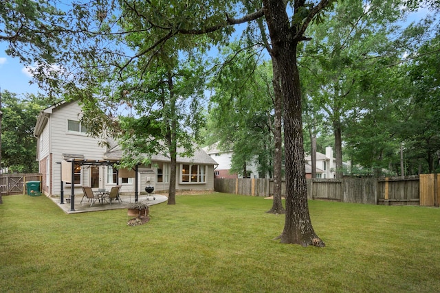 view of yard with a pergola and a patio area