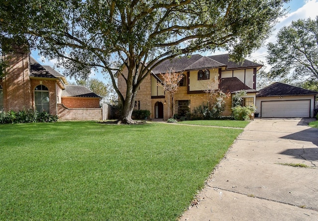 view of front facade featuring a front yard and a garage