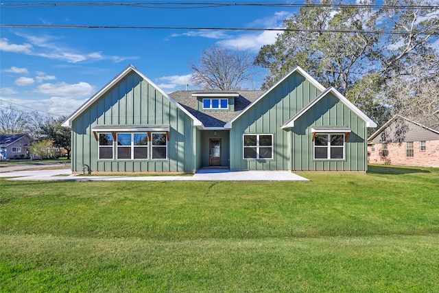 back of house with a yard