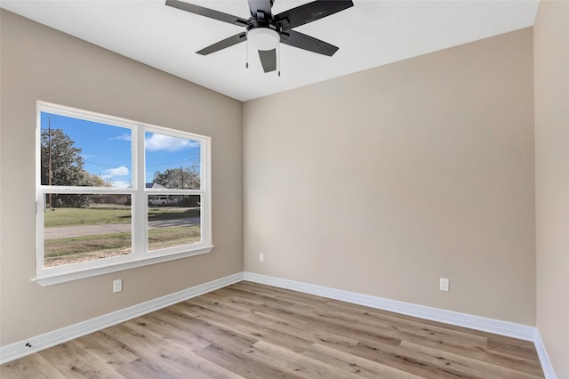 spare room with ceiling fan and light hardwood / wood-style floors