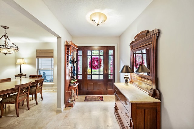 entrance foyer featuring a wealth of natural light