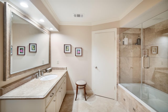 bathroom with vanity, enclosed tub / shower combo, and ornamental molding