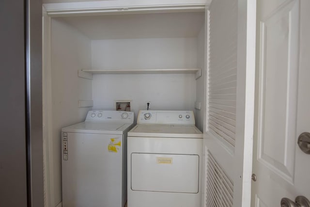 laundry room featuring washer and clothes dryer